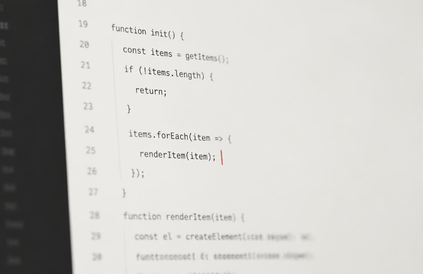 Close-up of source code on a screen with a single highlighted cursor